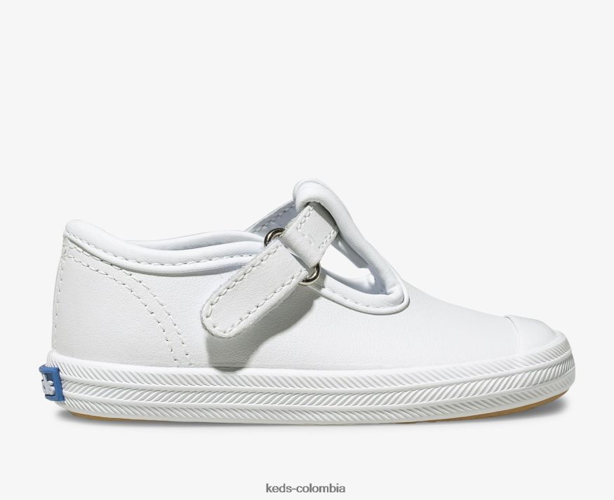 RF0RND232 tenis con tira en T y puntera Champion cuero blanco niño pequeño Keds