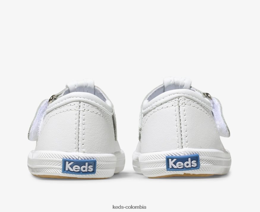 RF0RND232 tenis con tira en T y puntera Champion cuero blanco niño pequeño Keds