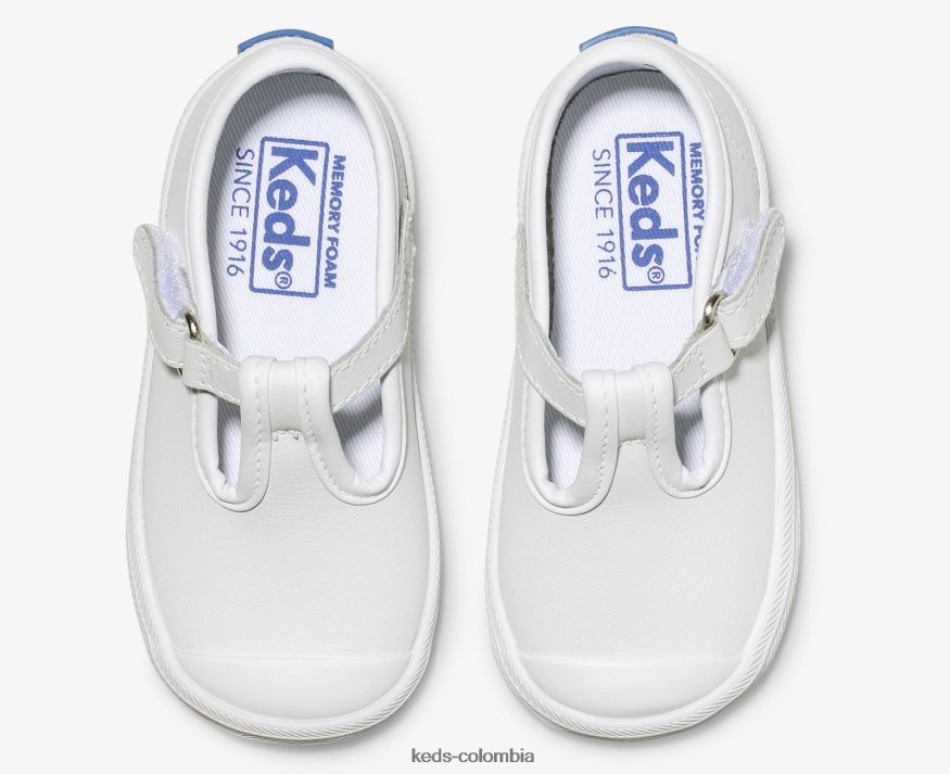RF0RND232 tenis con tira en T y puntera Champion cuero blanco niño pequeño Keds